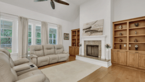 A spacious and elegantly designed living room in a Richmond Hill home, featuring modern furniture and natural light.