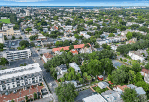 Realtor and homeowner reviewing a home selling plan in Savannah, GA