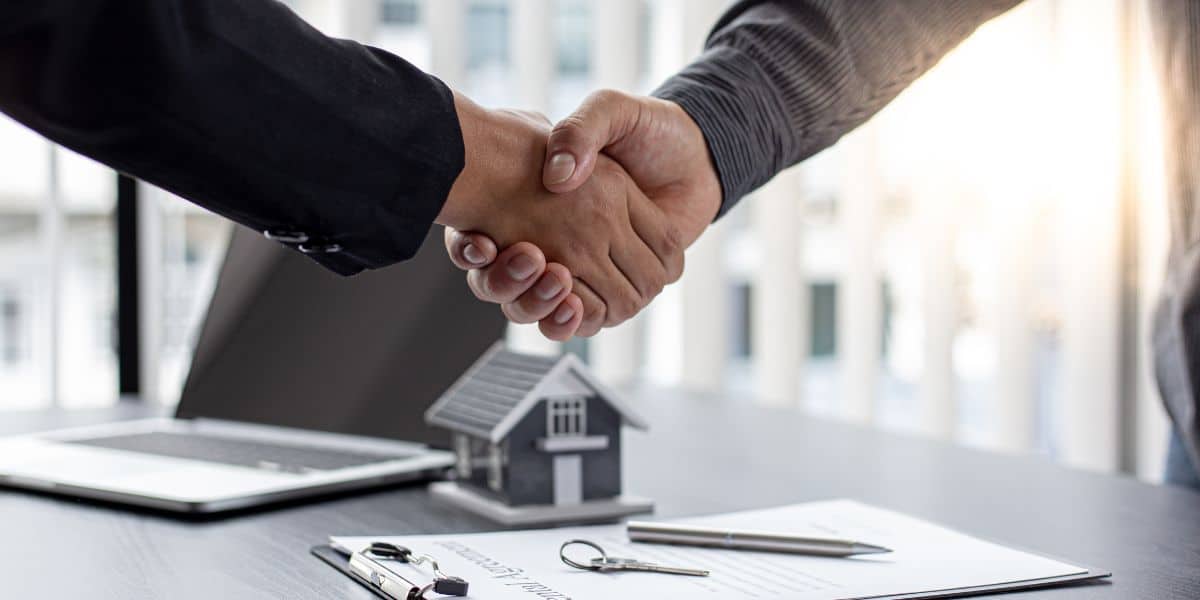 real estate purchase agreement being signed