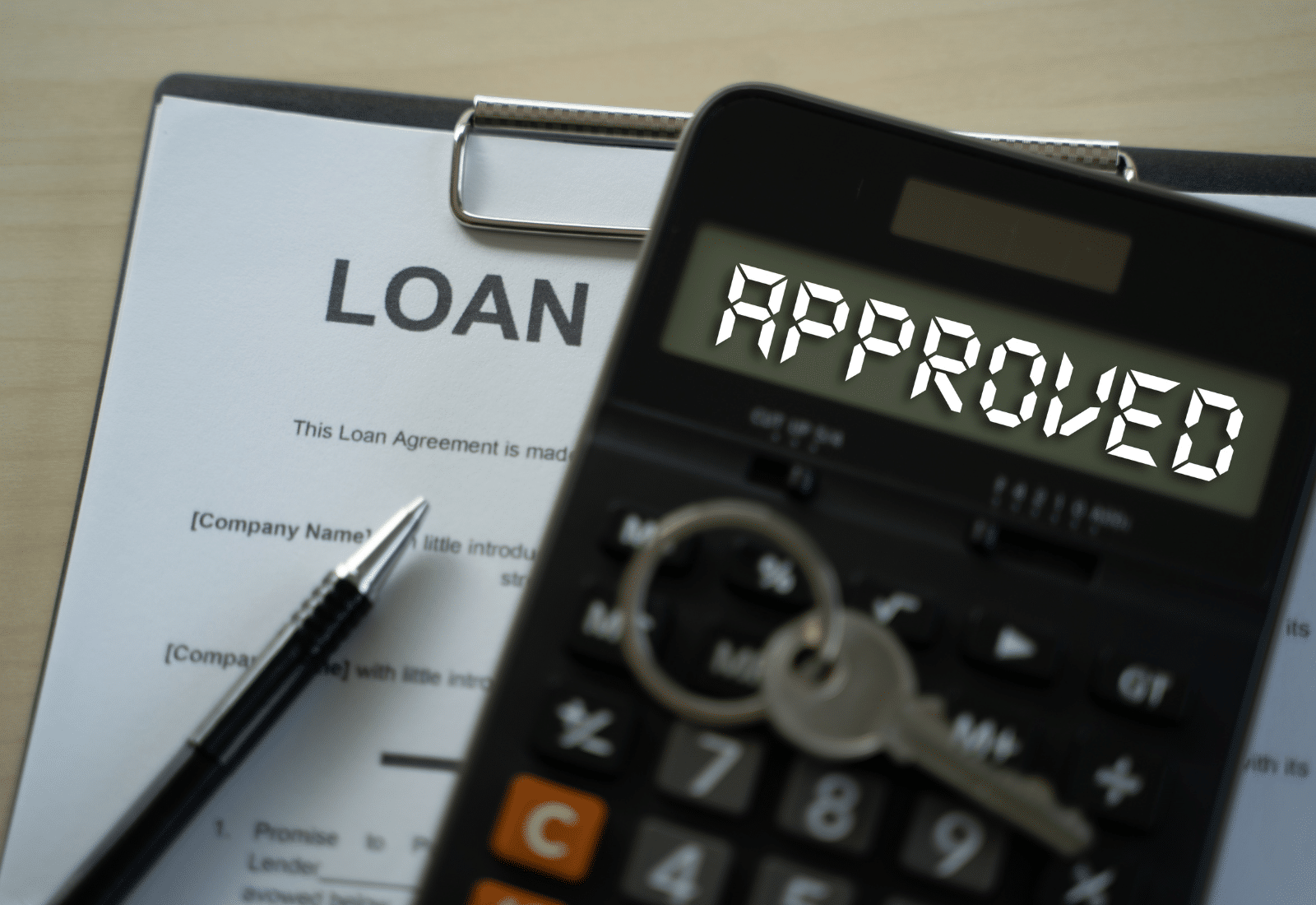 Close-up of a mortgage calculator comparing 20%, 5%, and 3.5% down payment amounts