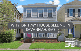 Front porch of a Savannah GA home with a for sale sign and classic southern charm